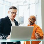 Man Using Silver Laptop